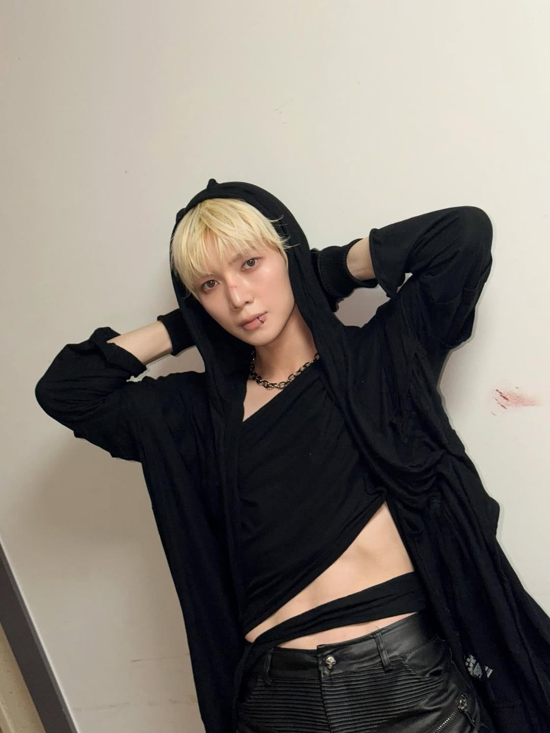 Photo by 여상 (YEOSANG) on February 13, 2026. May be an image of one or more people, bangs, top, bolo tie, costume and text.