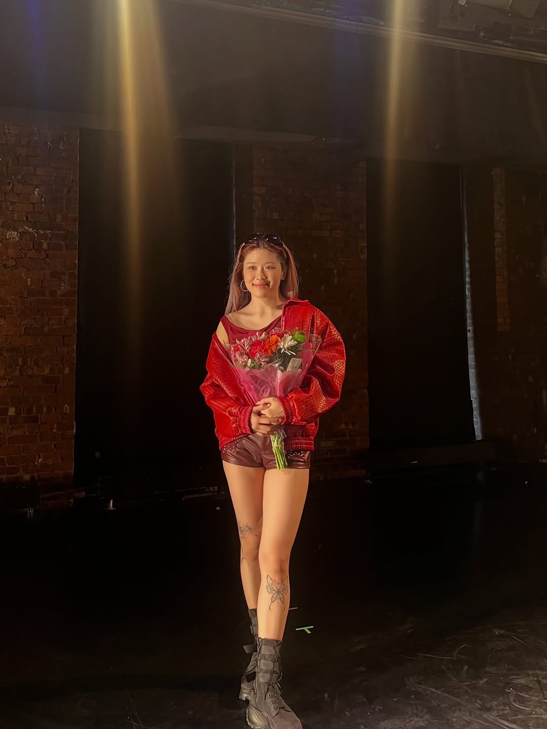 Photo by clara ⟡ 세인 on February 22, 2026. May be an image of one or more people, makeup, shorts, miniskirt, costume and text.