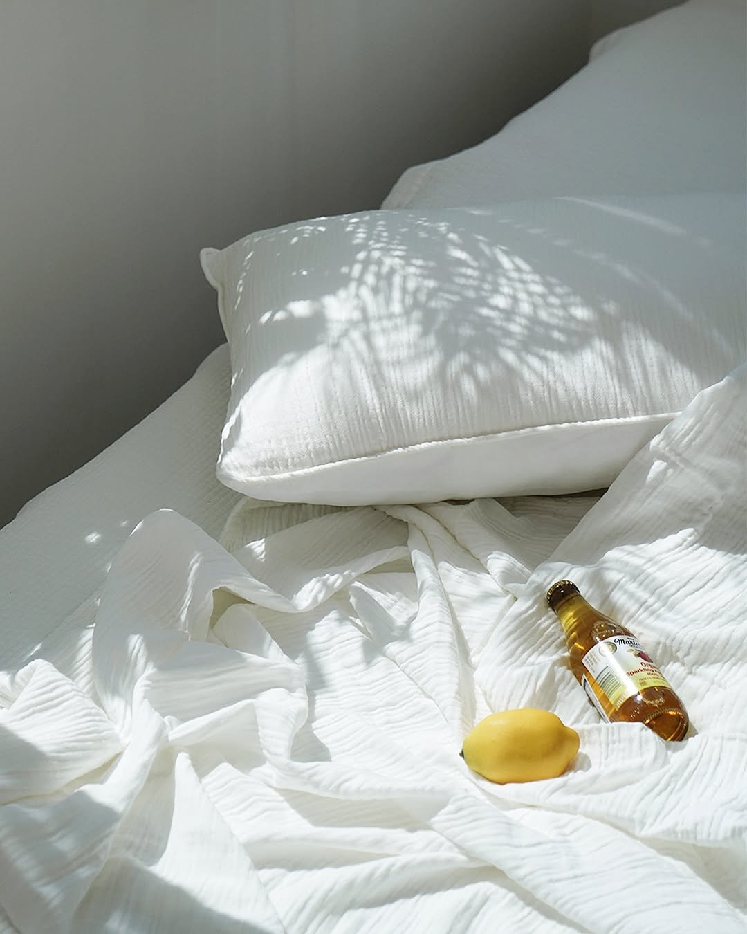 Photo by 아엠홈 on July 31, 2025. May be an image of fragrance, perfume, bed, mattress, hand cream, bedroom and text.