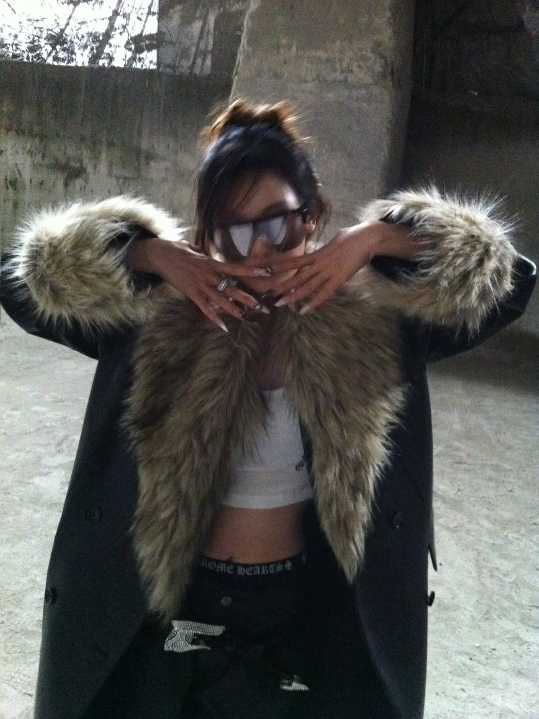 Photo by NINGNING on March 25, 2026. May be an image of sable coat, goosedown coat, overcoat, jacket, cloak, parka and text.