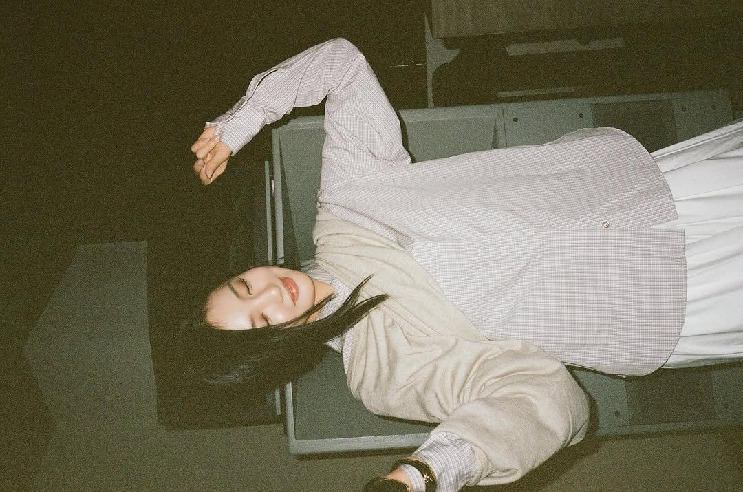 Photo by NINGNING on March 04, 2026. May be an image of sleeping, turtleneck and text.