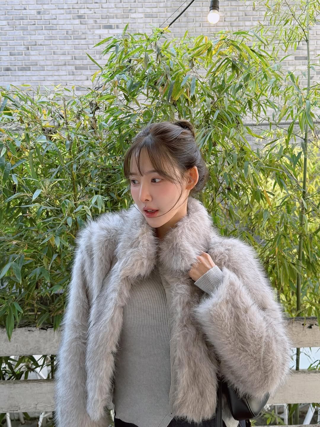 Photo by 이나연 on November 04, 2025. May be an image of goosedown coat, sable coat, duffle coat, overcoat, cardigan, turtleneck, parka, jacket and text.