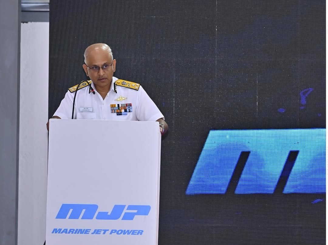 Photo by Indian Coast Guard on February 12, 2026. May be an image of microphone, stadium and text that says 'だに LIIIE IIII MJE MARINEJETPOWER MARINE JET POWER'.