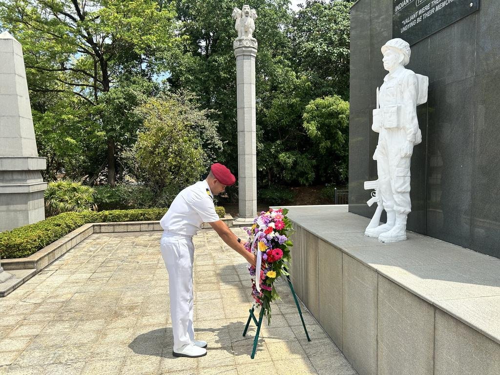 Photo by Indian Navy Official Account on April 23, 2026. May be an image of the Tomb of the Unknown Soldier, the Vietnam Veterans Memorial, statue and text.