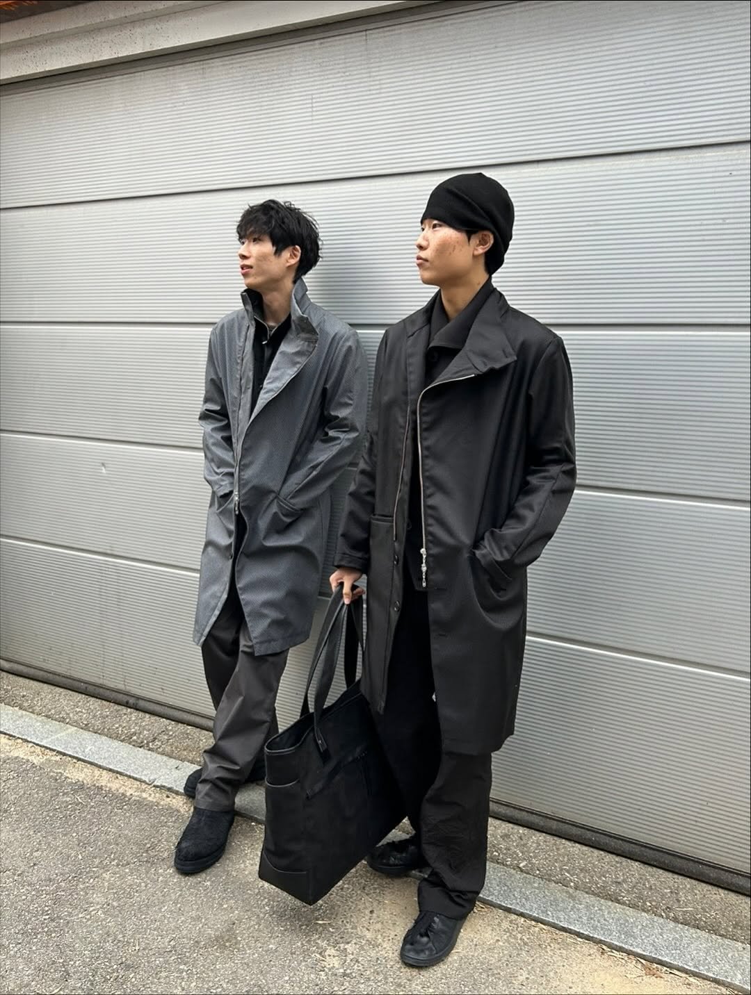 Photo shared by @eburnean.stairs on October 31, 2025 tagging @insidetheemotion. May be an image of one or more people, duffle coat, overcoat, raincoat, suit, parka and text.