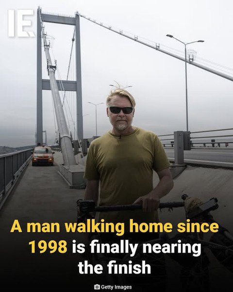 Photo by Interesting Engineering on March 02, 2026. May be an image of one or more people, suspension bridge and text that says 'IE ETRT A man walking home since 1998 is finally nearing the finish Getty Images'.