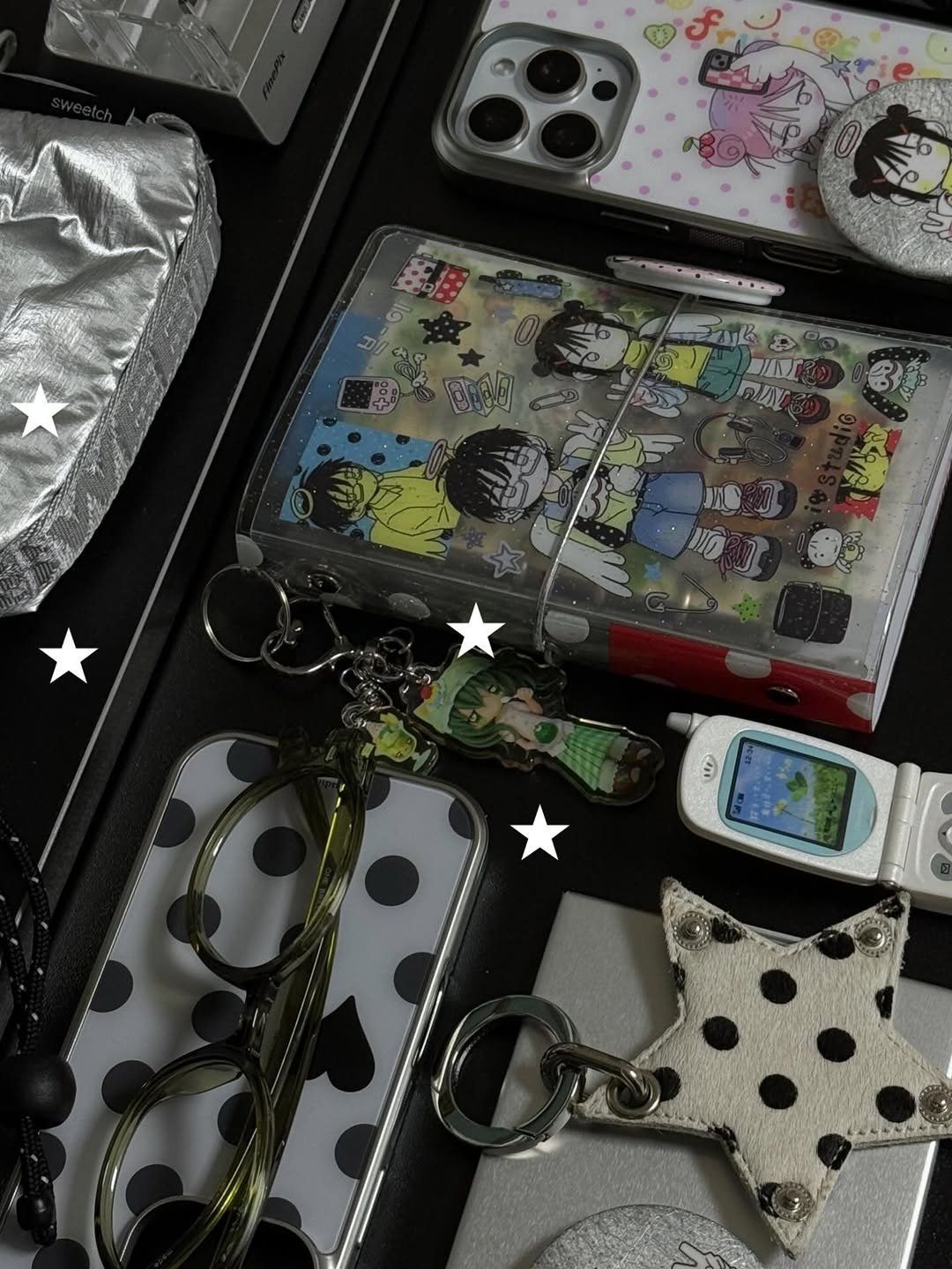 Photo shared by 아이오스튜디오 ◝✩ on February 11, 2026 tagging @io_studio__. May be an image of phone, digital audio player, tablet, pencil case and text.