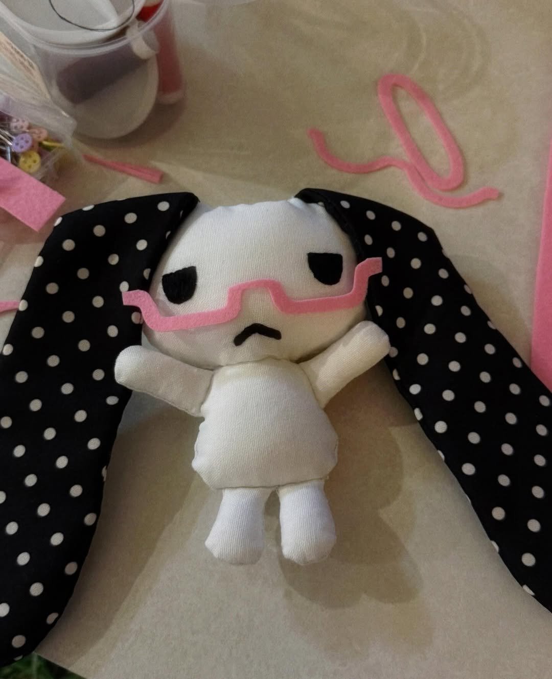 Photo by 아이오스튜디오 ◝✩ on January 27, 2026. May be an image of doll, stitching and text.