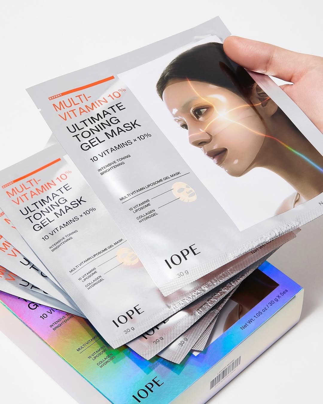 Photo by 아이오페 ɪᴏᴘᴇ on October 31, 2025. May be an image of one or more people, makeup, magazine and text.