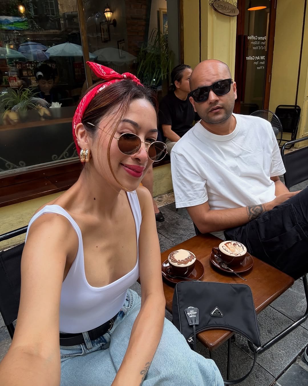 Photo shared by Isha Borah on July 31, 2025 tagging @hm, and @zara. May be an image of 2 people, eyewear, headscarf and text.