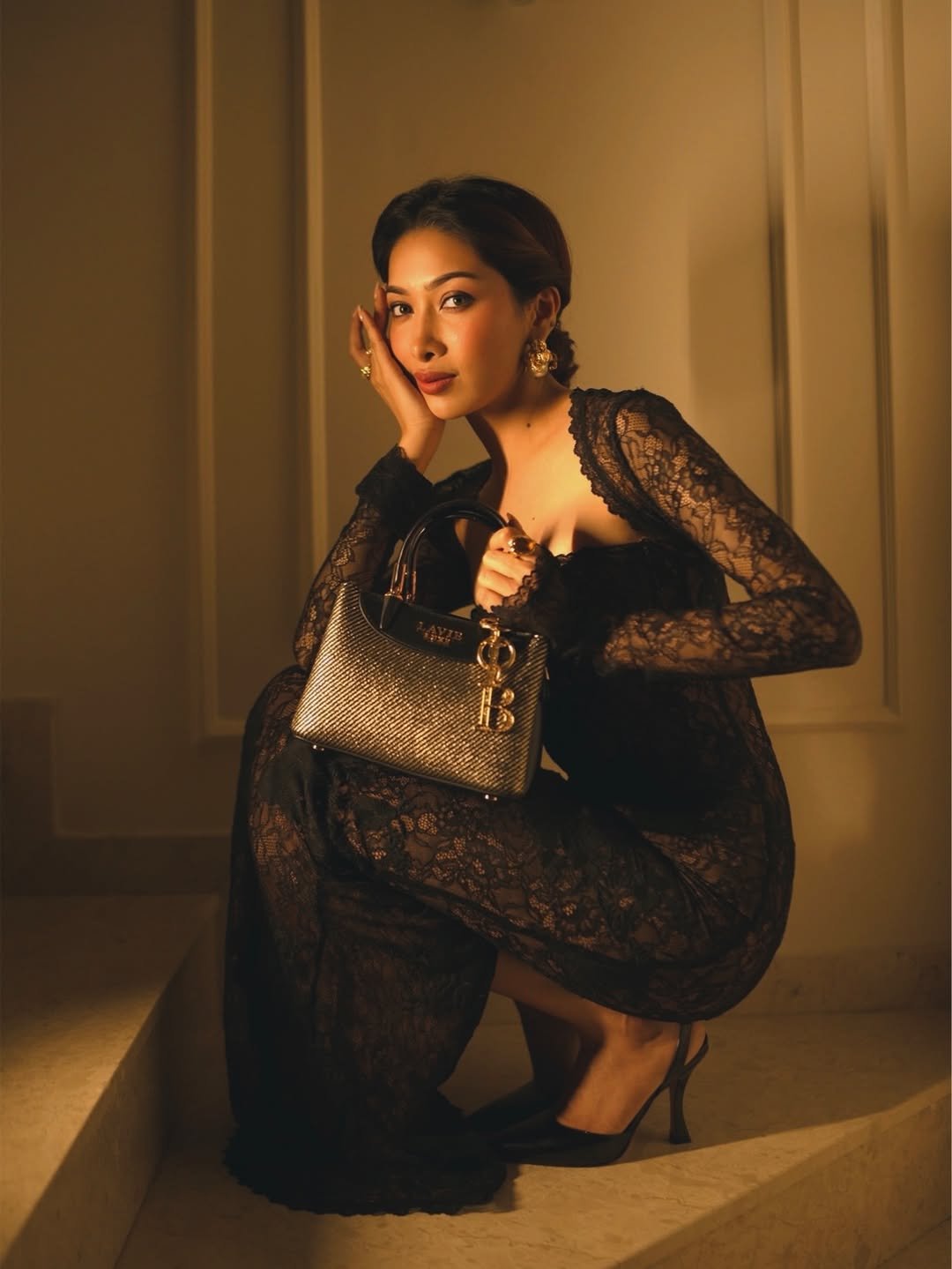 Photo shared by Isha Borah on November 25, 2025 tagging @lavieworld. May be an image of purse, dress and text.