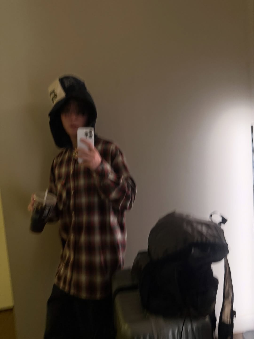 Photo by islwav on March 16, 2026. May be a selfie of suitcase, luggage, flannel and text.