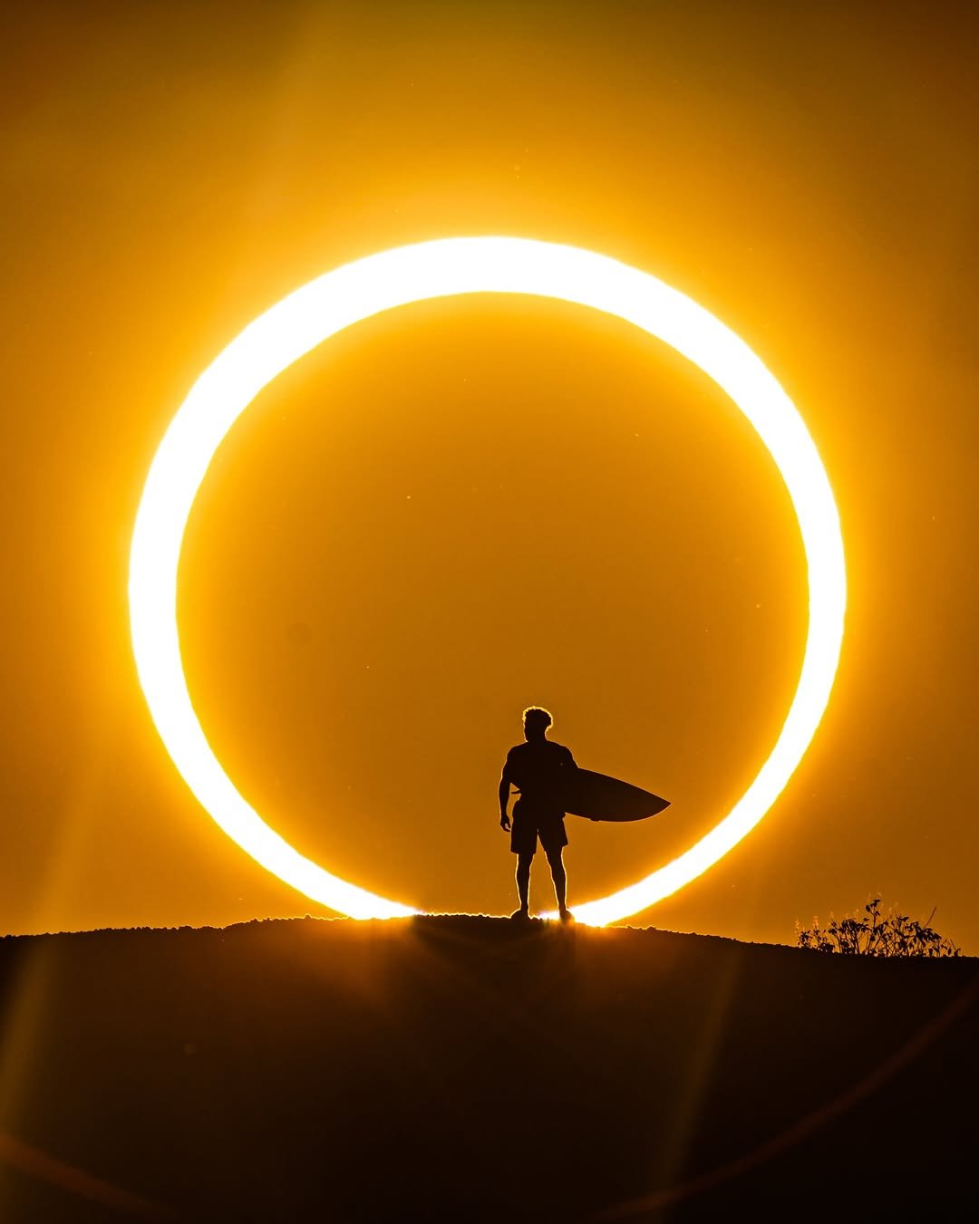 Photo by Italo Ferreira on December 18, 2025. May be an image of eclipse and text.