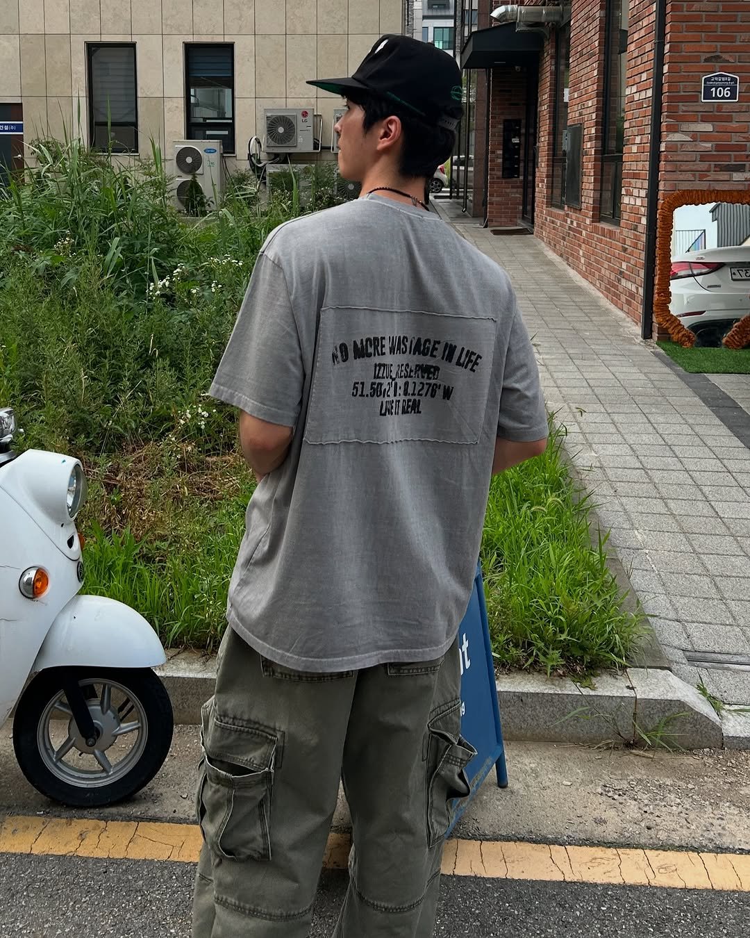Photo by 정재훈 | CAON on July 26, 2025. May be an image of 1 person, skateboard, scooter, street and text.