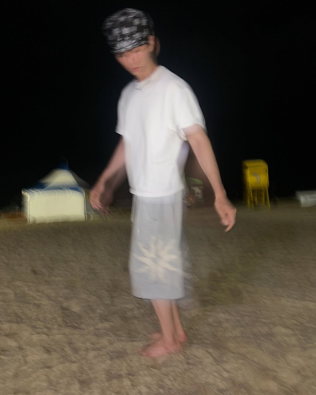 Photo by 정재훈 | CAON on July 22, 2025. May be an image of 1 person, bandanna, headscarf, sarong, beach, night and text.