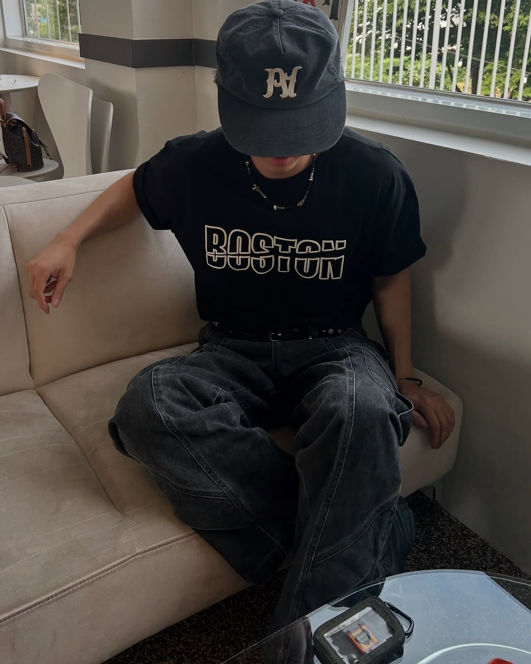 Photo by 정재훈 | CAON on July 14, 2025. May be an image of 1 person, hat, portable cassette player, sweatpants and text that says 'RNGTOO ৩ততাতা BOSTON উতত'.