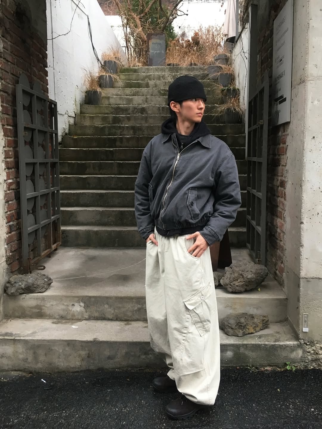 Photo by 정재훈 | CAON on December 25, 2025. May be an image of duffle coat, parka, sweatpants and text.