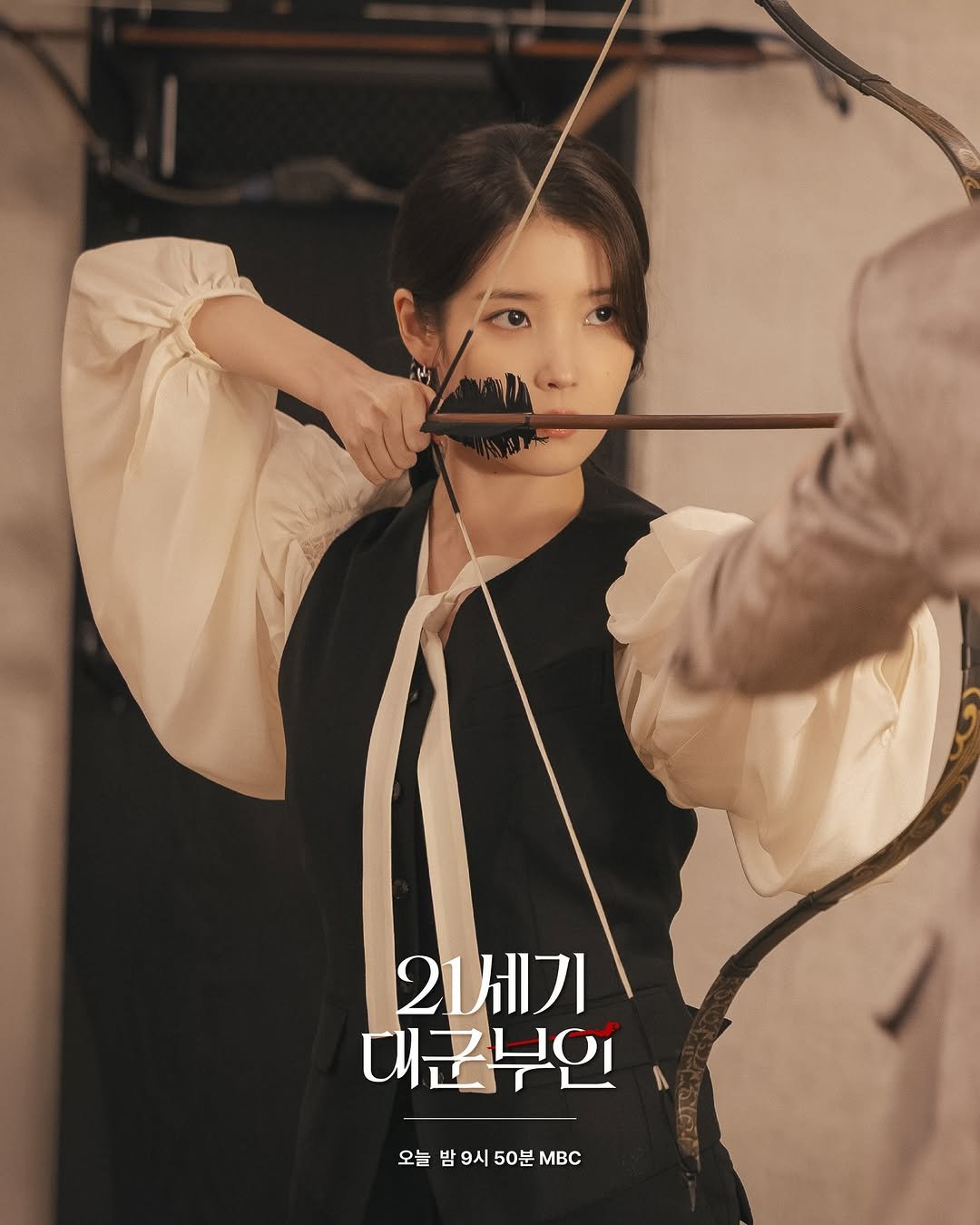 Photo shared by 아이유(IU) on April 24, 2026 tagging @dlwlrma. May be an image of poster and text that says '2세기 대군부인 오늘 밤 늘밤9시50분MBC 밤 9시 5 50분 0부 MBc'.