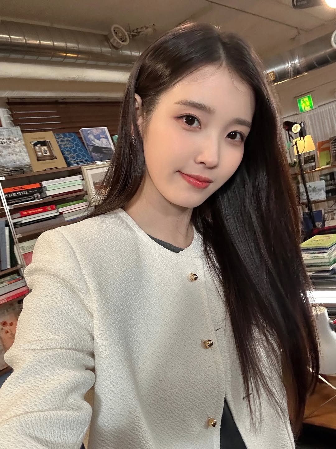 Photo shared by 아이유(IU) on April 23, 2026 tagging @dlwlrma. May be an image of one or more people, hair and text.