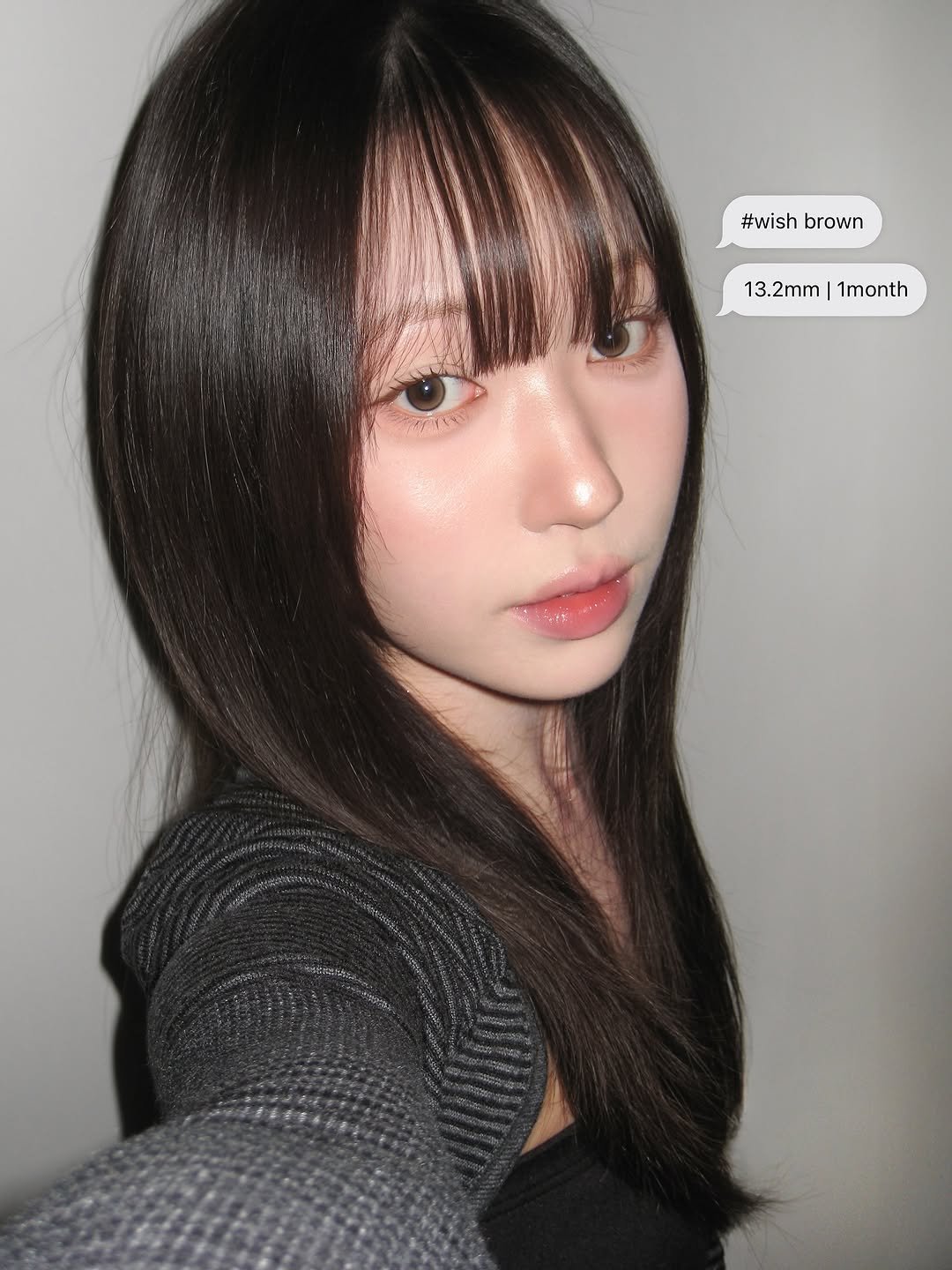 Photo shared by 믾의 minhee on October 29, 2025 tagging @_lenssis. May be an image of one or more people, bangs, long hair and text that says '#wish #wishbrown brown 13.2mm 13.2mm|1month 1month 1month emTT'.