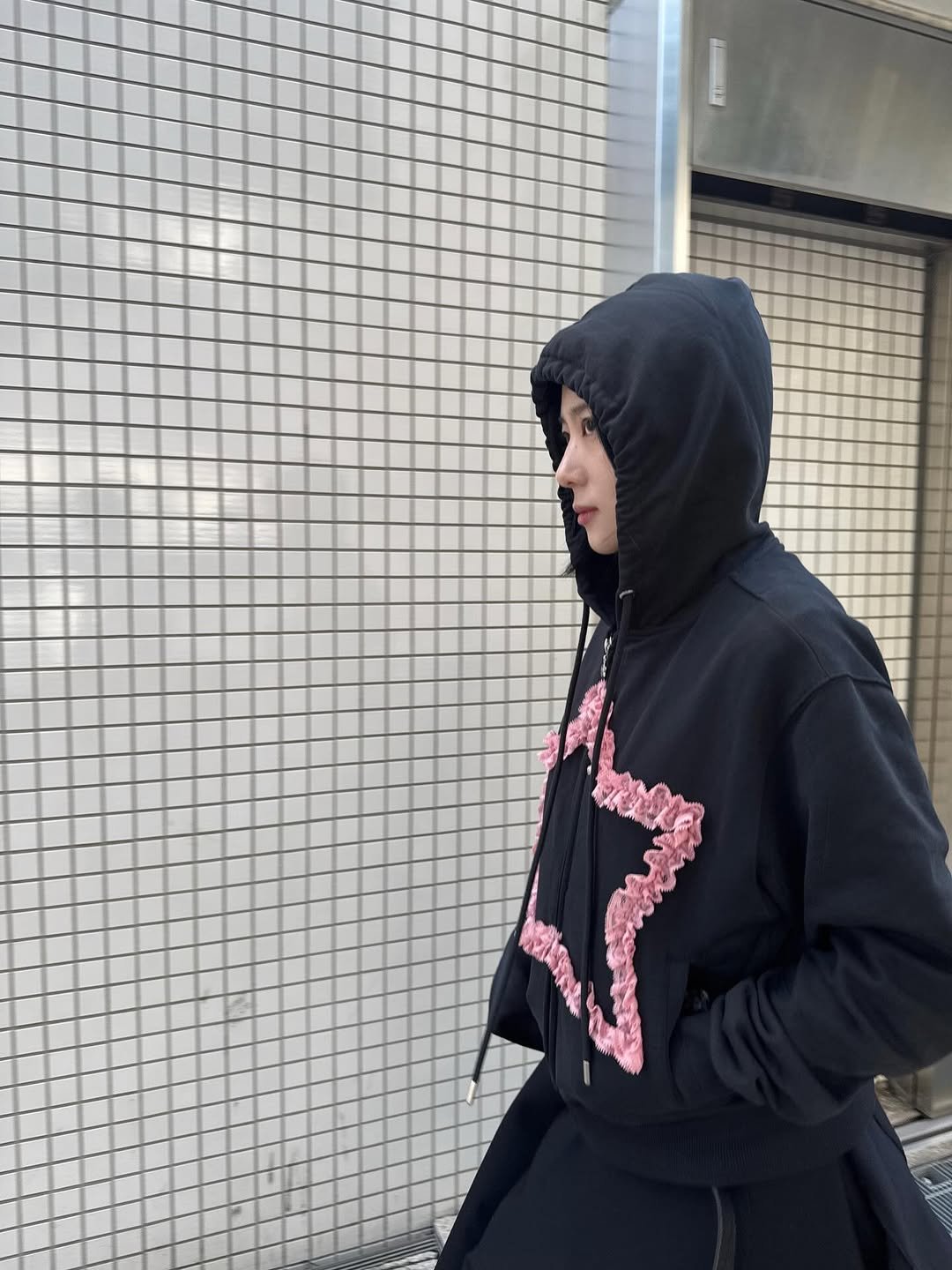 Photo by 김경은 on November 23, 2025. May be an image of activewear, jacket, sportswear, sweatpants, raincoat, sweatsuit, parka, sweatshirt and text.