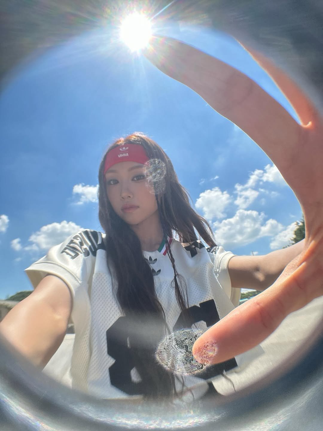 Photo by izna (이즈나) on November 23, 2025. May be an image of bandanna, glasses and text.