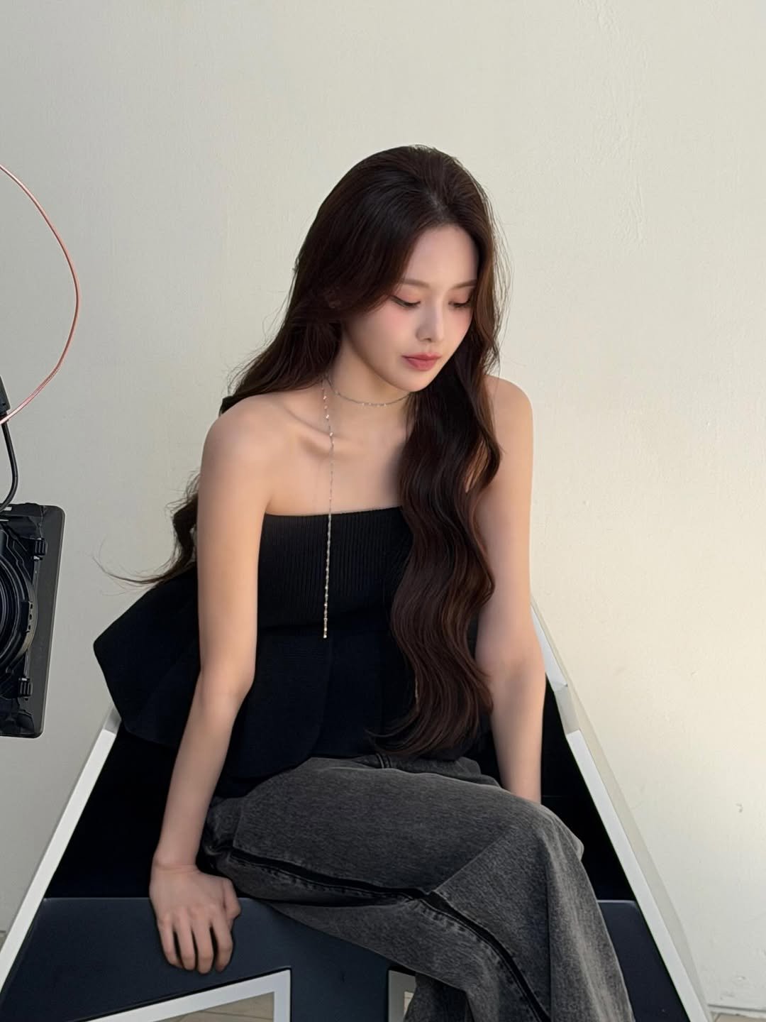 Photo by izna (이즈나) on January 13, 2026. May be an image of one or more people, hair, top, dress, jumpsuit and text.