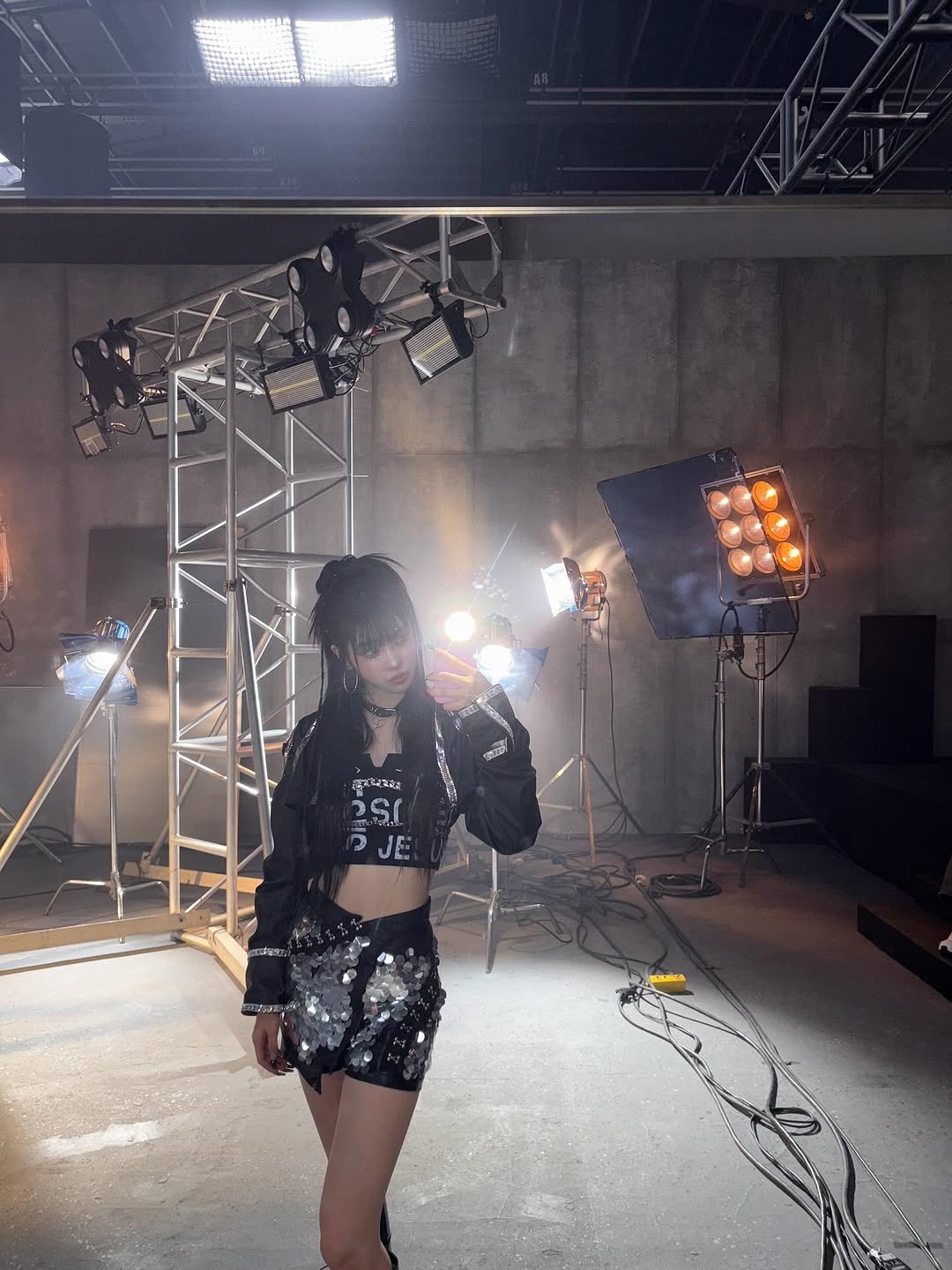 Photo by izna (이즈나) on November 24, 2025. May be an image of miniskirt and text.