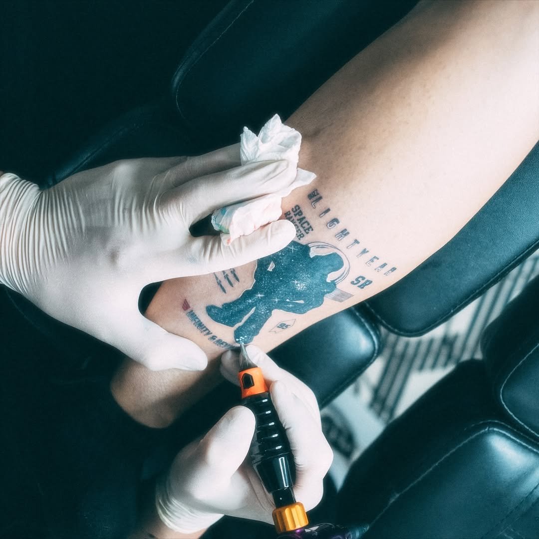 Photo by Jackson Wang on November 22, 2025. May be an image of one or more people, henna, tattoo, eagle, skull and text.