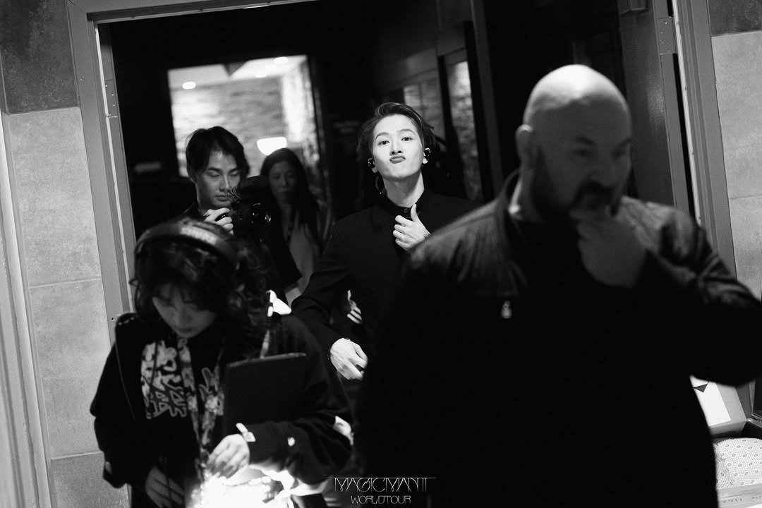 Photo by Jackson Wang on April 10, 2026. May be a black-and-white image of one or more people and text.