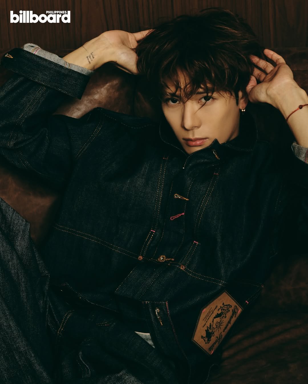 Photo shared by Jackson Wang on December 29, 2025 tagging @billboardphofficial. May be an image of one or more people, bangs, poster, magazine and text.