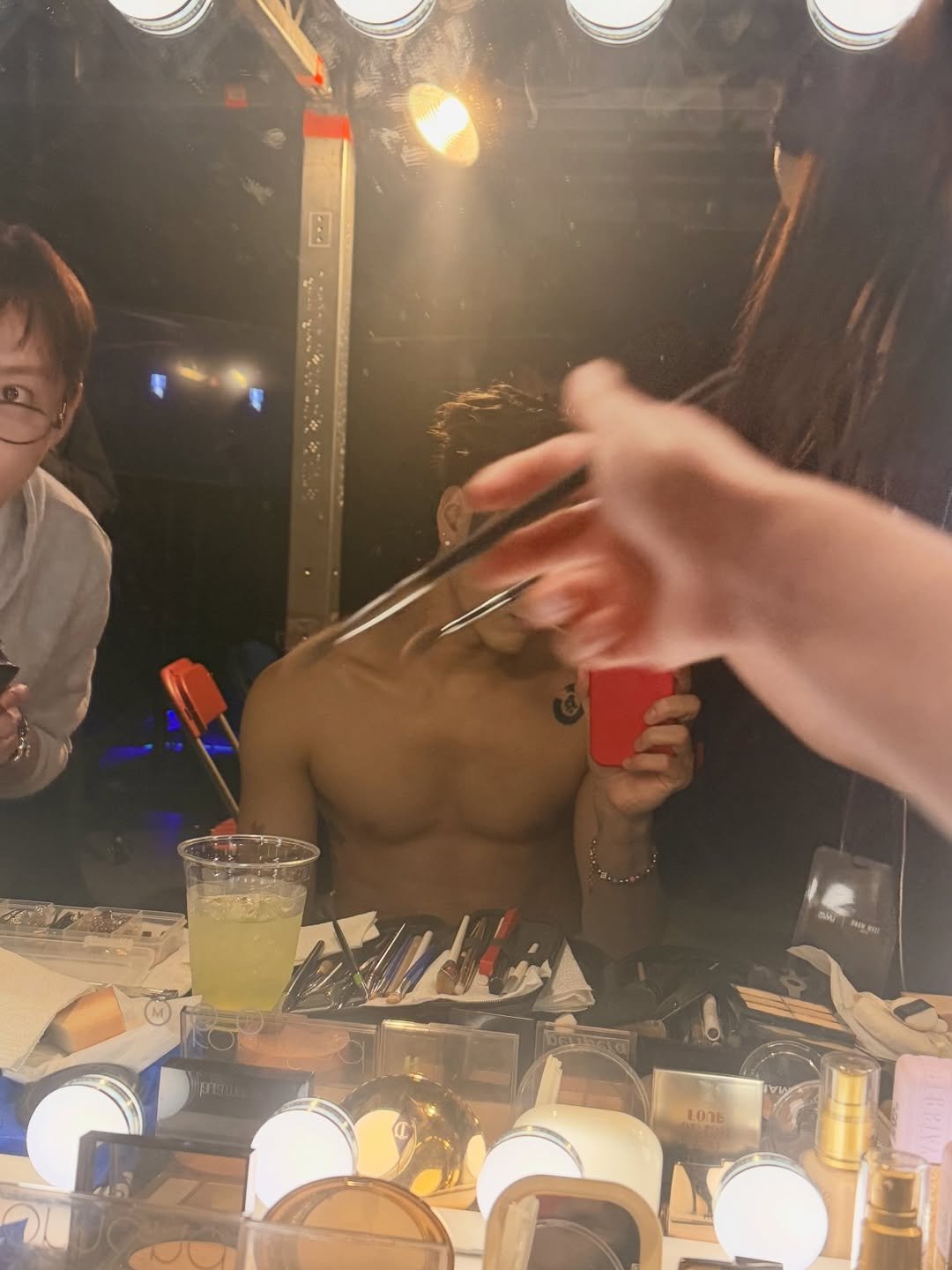 Photo by Jackson Wang on April 08, 2026. May be an image of one or more people, makeup and text.