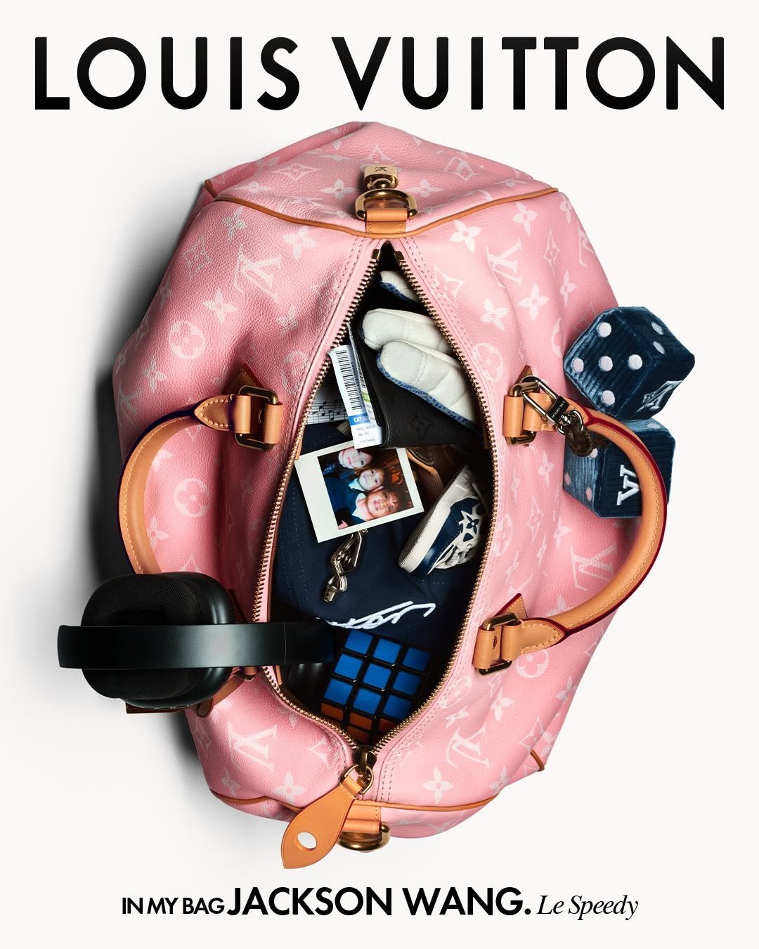 Photo shared by Louis Vuitton on April 03, 2026 tagging @pharrell, and @jacksonwang852g7. May be an image of magazine, poster, portable cassette player and text.