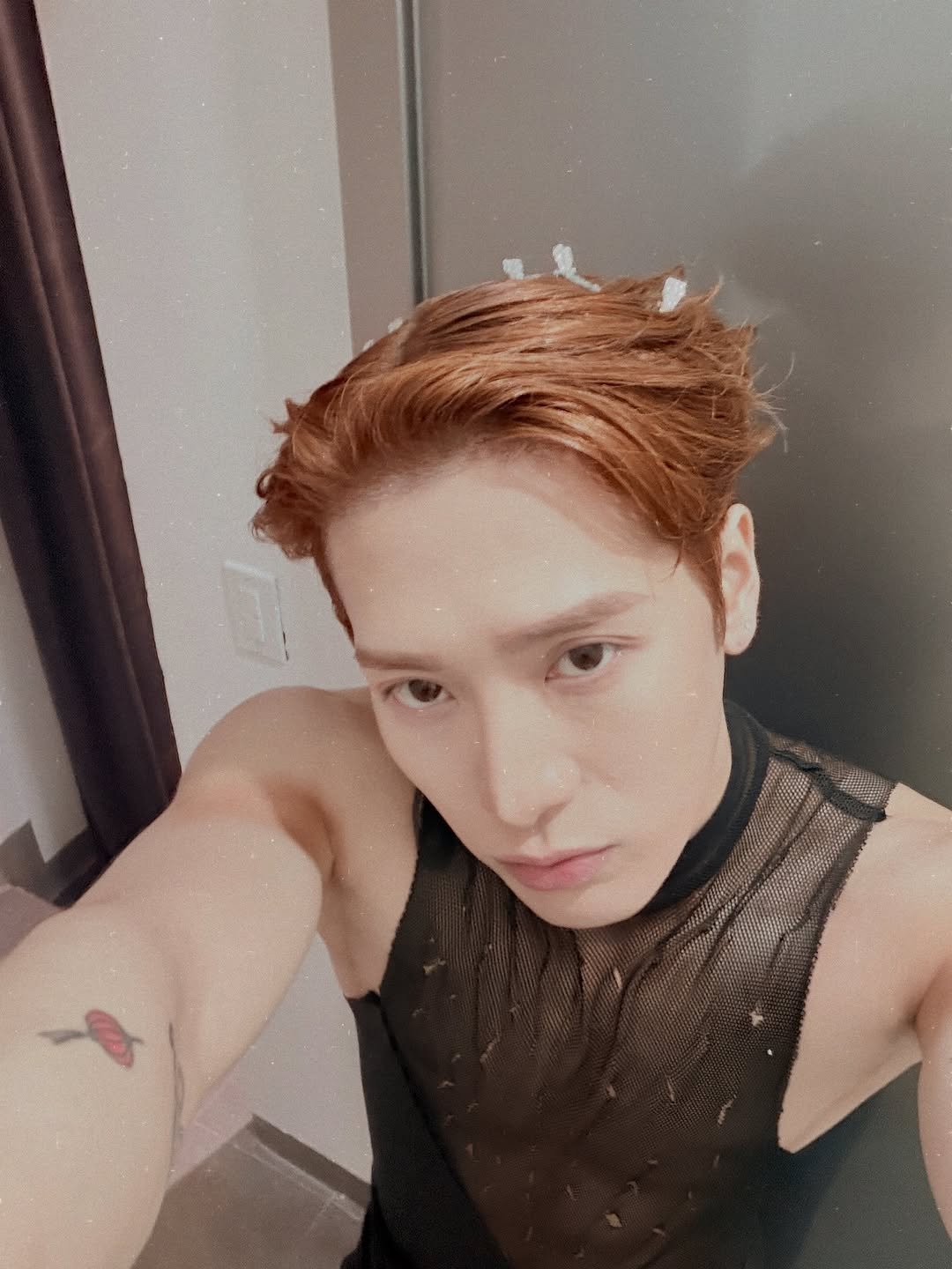 Photo by Jackson Wang on April 23, 2026. May be an image of one or more people, hair and text.