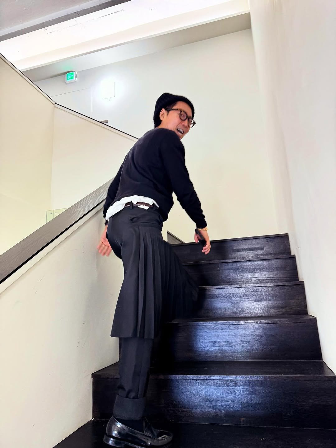 Photo by 정재형 on October 24, 2025. May be an image of wingtip shoes, turtleneck, kilt and text.