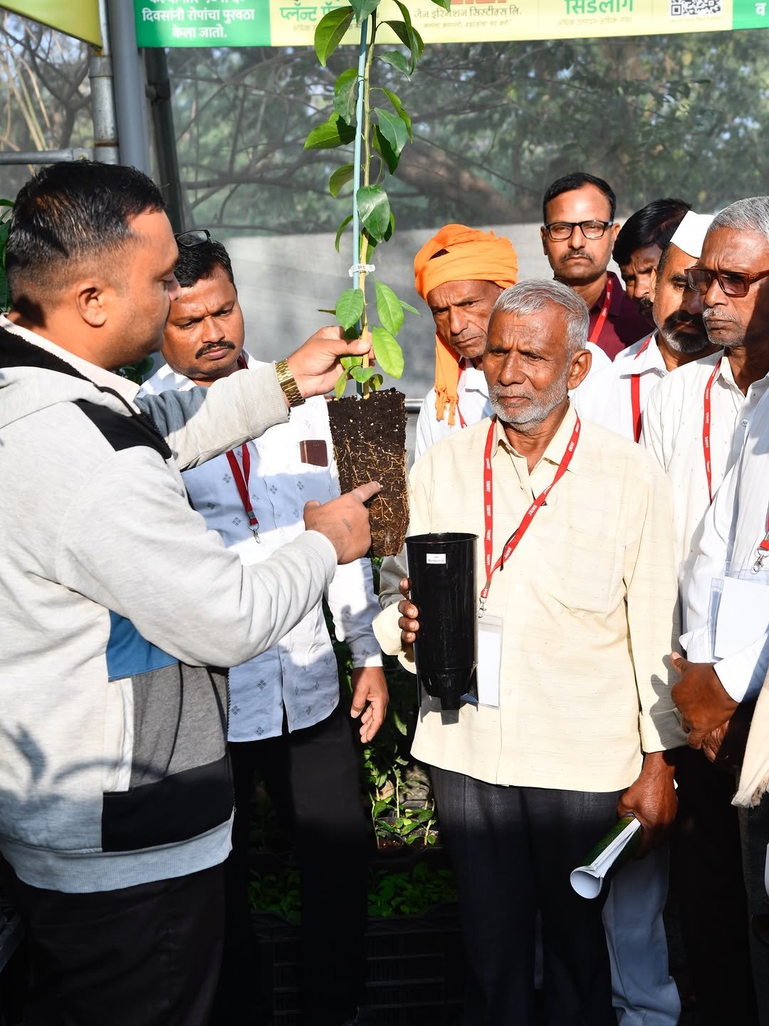 Photo shared by Jain HI-TECH Plant Factory🪴 \\ Jain Tissue Culture 🌱 on January 10, 2026 tagging @jainirrigation_. May be an image of standing, tree and text.
