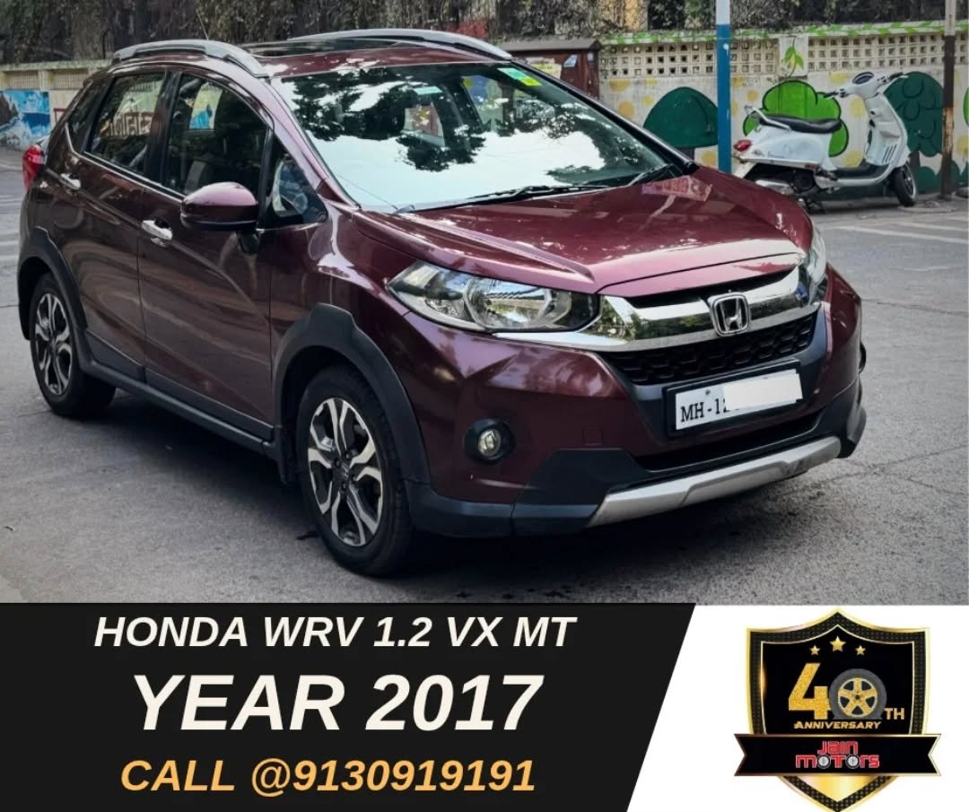 Photo by JAINMOTORS PUNE on November 21, 2025. May be an image of sedan, minivan, wheel and text that says 'MH-IL. -IL MH HONDA WRV 1.2 VX MT YEAR 2017 CALL @9130919191 4火 4 TH ANNIV NNIVERSARY RSAR moTers'.