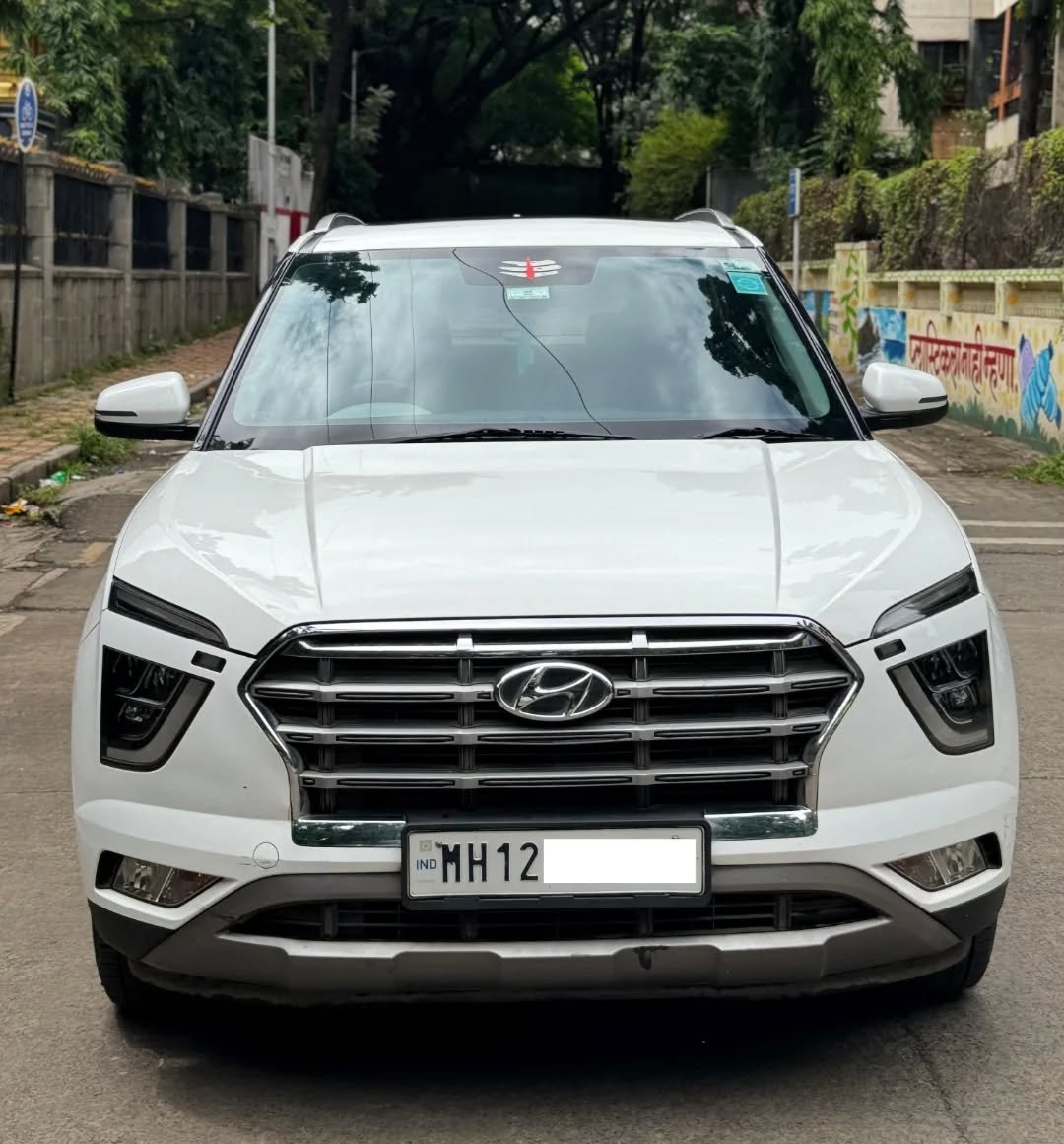 Photo by JAINMOTORS PUNE on November 27, 2025. May be an image of windshield, sedan, wheel and text that says '돈료 IND MH12 IND MH1 12'.