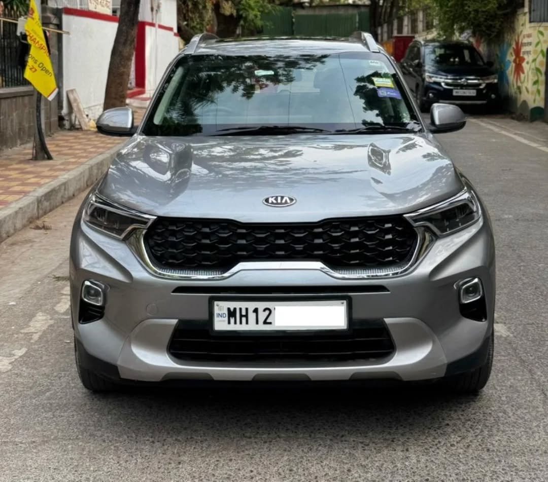 Photo by JAINMOTORS PUNE on April 21, 2026. May be an image of sedan, minivan, windshield and text that says 'KIA IND IND MH12'.
