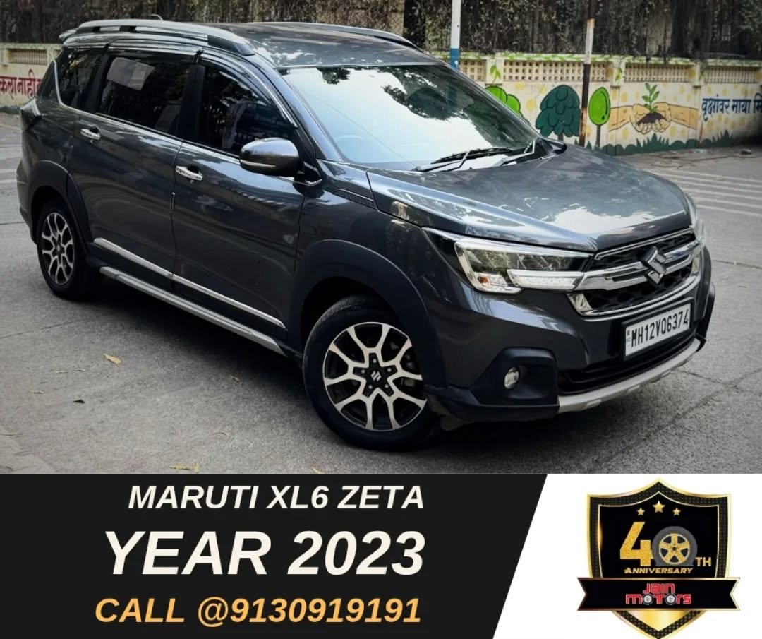 Photo by JAINMOTORS PUNE on November 29, 2025. May be an image of sedan, wheel and text that says 'मवानाहा "MH12Y06376 祭 MARUTI XL6 ZETA YEAR YEAR2023 2023 CALL @9130919191 40 4 TH ANNI ANNIVERSARY RSARY moTOrS'.