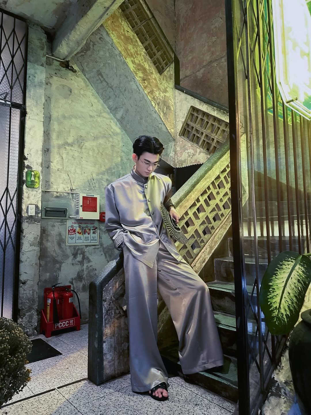 Photo by Trần Võ Nhật Kiên on February 11, 2026. May be an image of suit, jumpsuit and text.