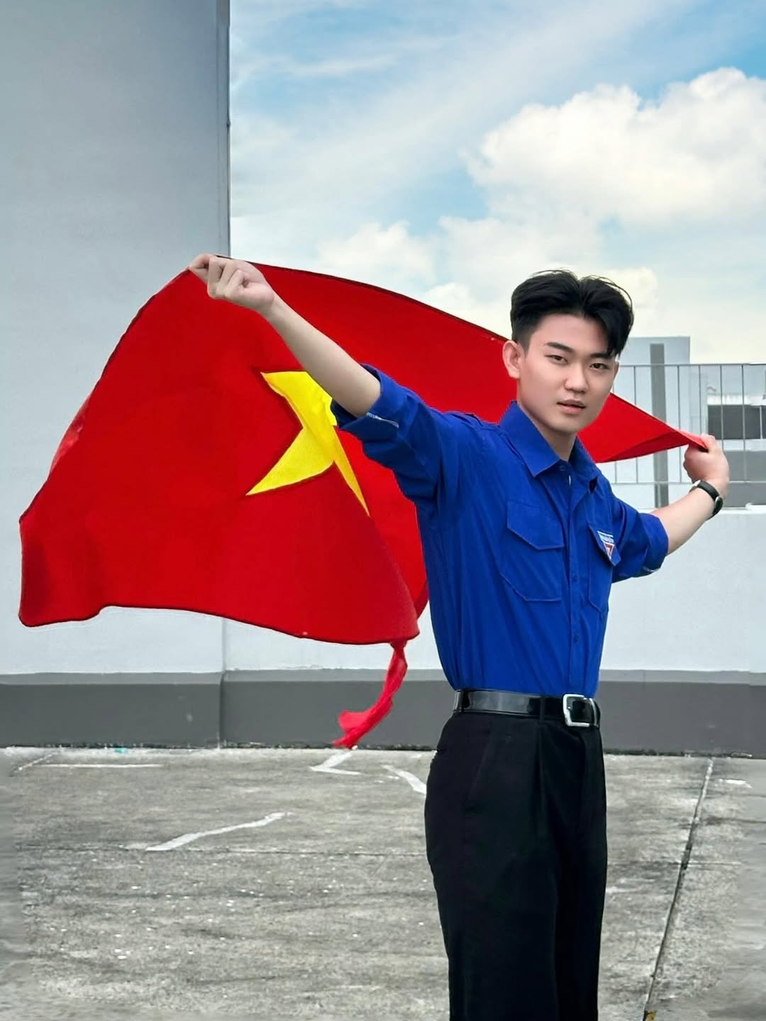 Photo by Trần Võ Nhật Kiên on August 25, 2025. May be an image of 1 person, flag and text.