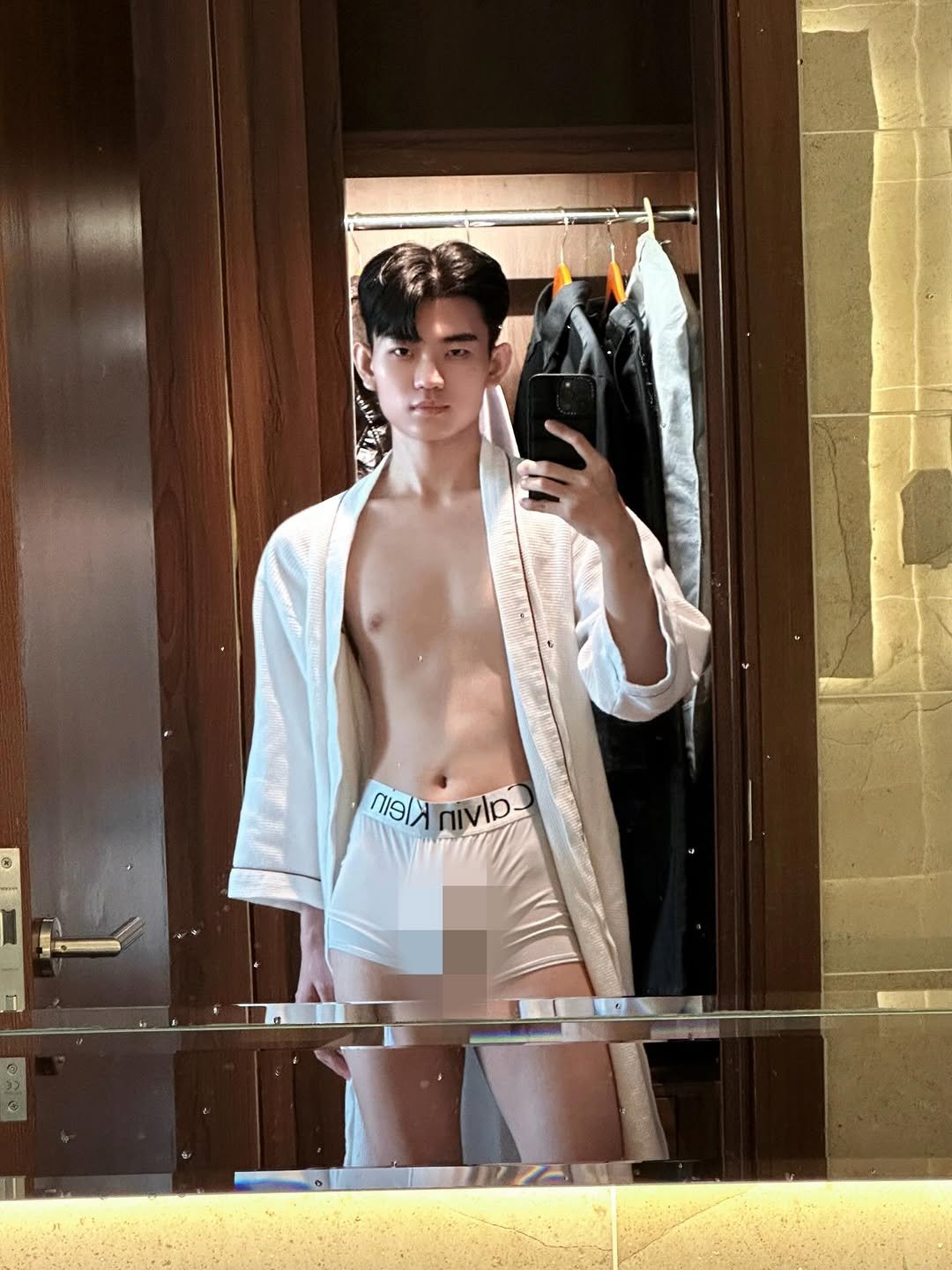 Photo by Trần Võ Nhật Kiên on February 24, 2026. May be an image of bath robe and text.