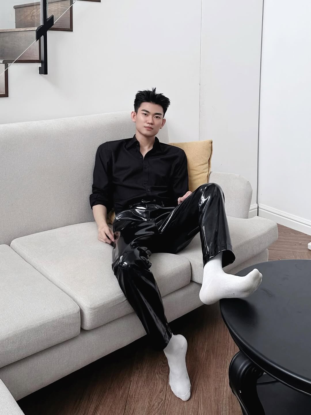 Photo by Trần Võ Nhật Kiên on April 20, 2026. May be an image of one or more people, wingtip shoes, sweatpants and text.