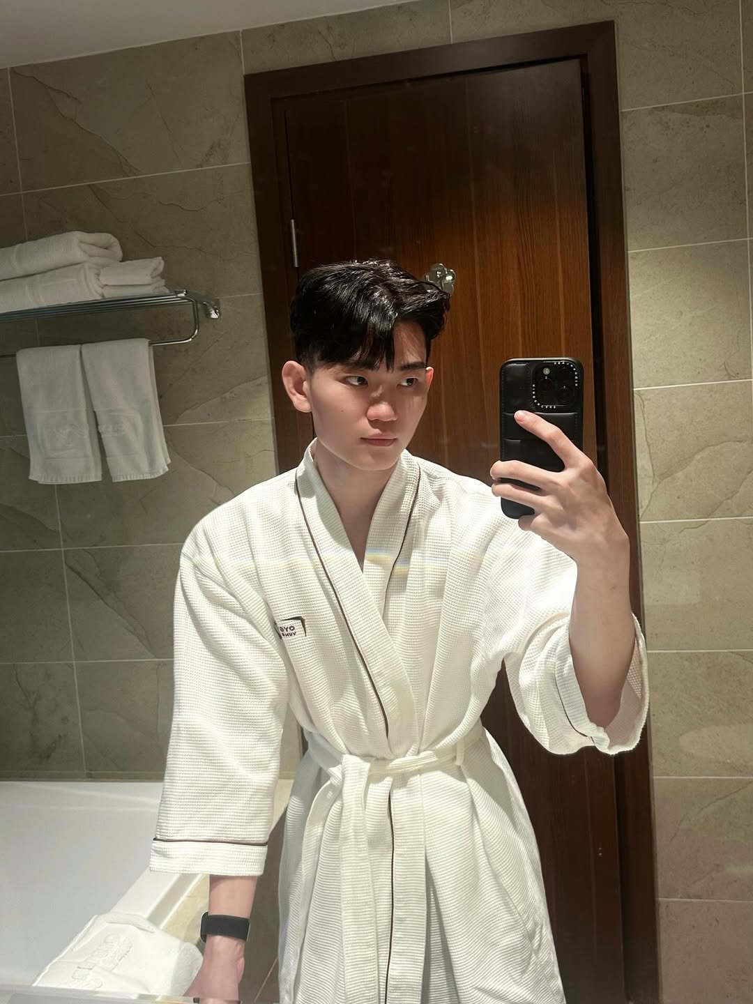 Photo by Trần Võ Nhật Kiên on February 25, 2026. May be a selfie of bath robe, robe and text.