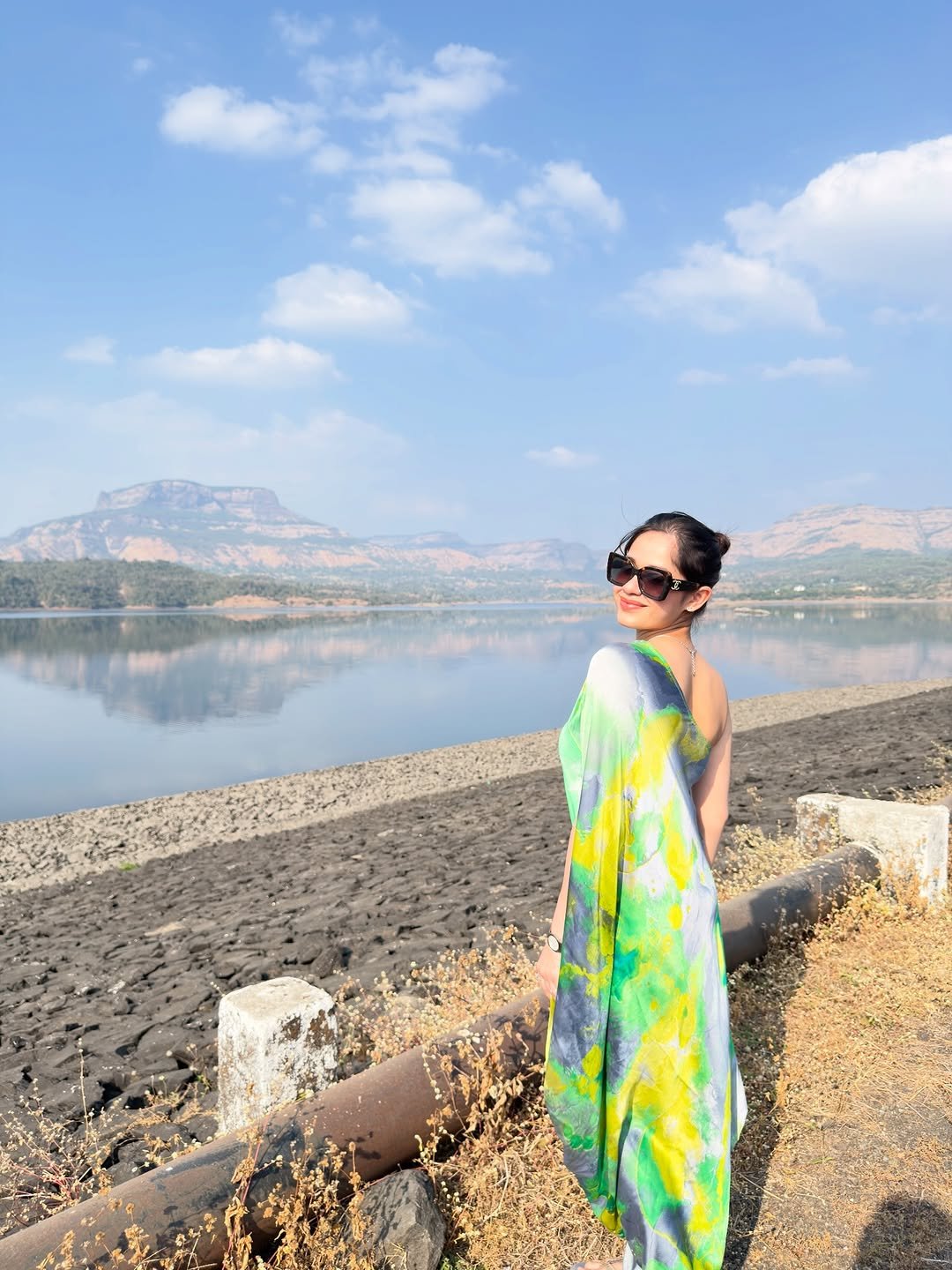 Photo by Jannat Zubair Rahmani on January 15, 2026. May be an image of headscarf, sarong, lake and text.