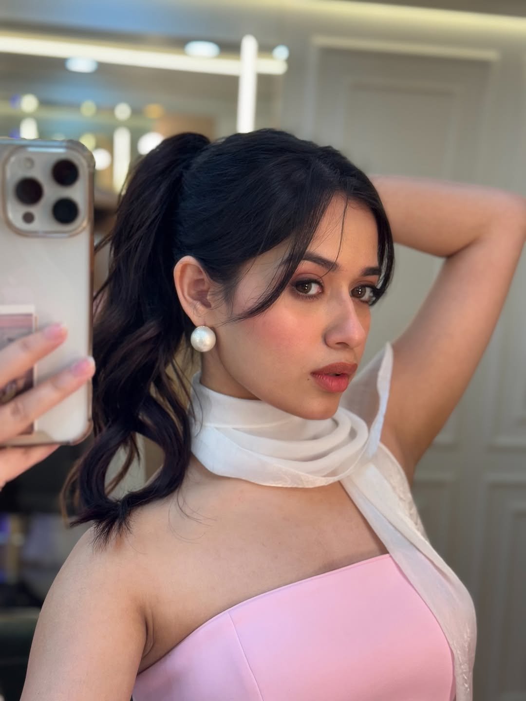 Photo by Jannat Zubair Rahmani on November 07, 2025. May be a selfie of one or more people, hair, mirror, top, dress and text.
