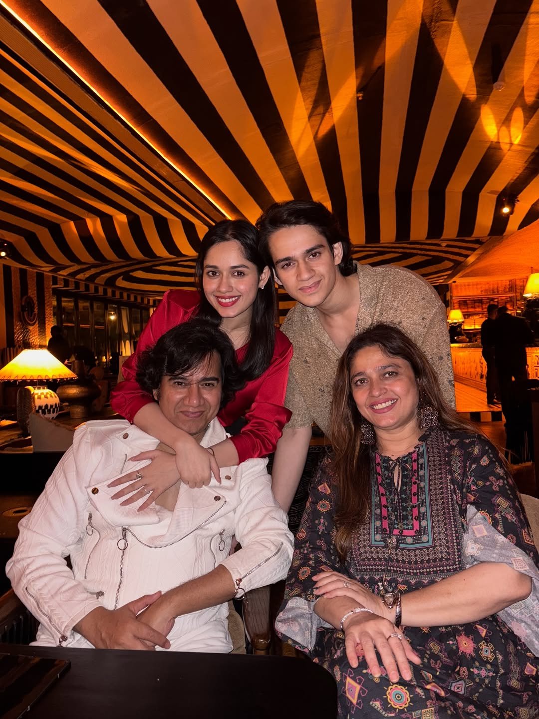 Photo by Jannat Zubair Rahmani on December 31, 2025. May be an image of one or more people, people smiling and text.