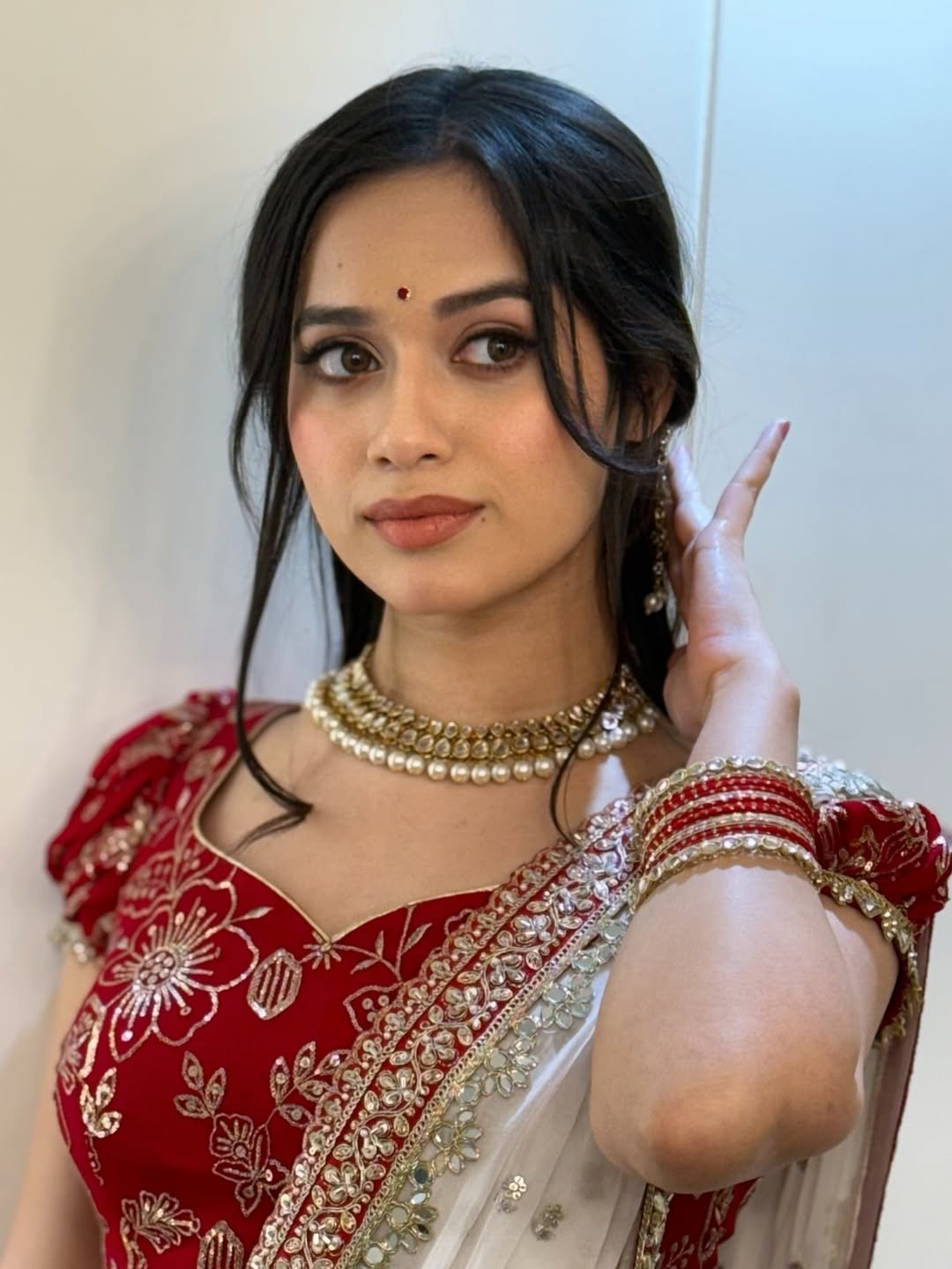 Photo by Jannat Zubair Rahmani on December 21, 2025. May be an image of one or more people, henna, makeup, jewelry, net and text.