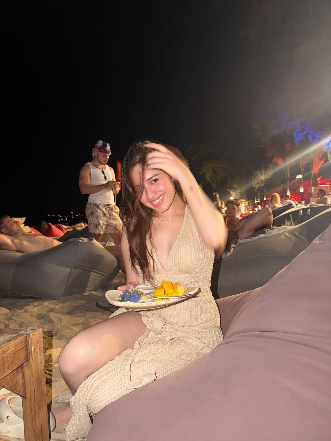 Photo by Jannat Zubair Rahmani on April 18, 2026. May be an image of sundress, night, picnic and text.